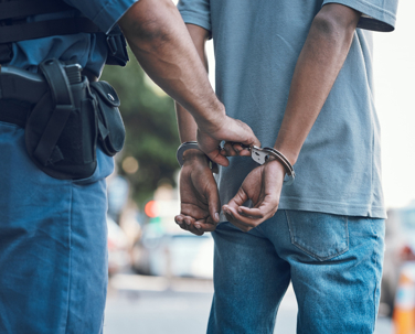 Police arresting man