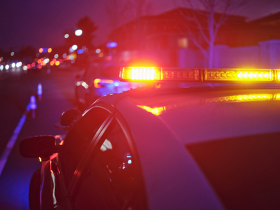 Police car with sirens on