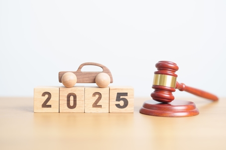 car on top of 2025 blocks with gavel