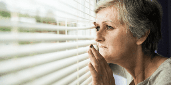 woman looking out of a window